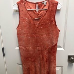 Nylon with sequins fun to front longer than back